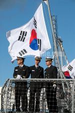 ID 6371 ROKS YANG MANCHOON (DDH 973) a Kwanggaeto-class helicopter destroyer - officers supervise preparations for the departure of the Republic of Korea's navy ship which along with the Cheonji-class fast...